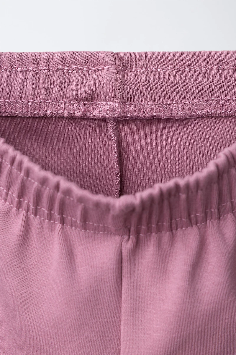 WIDE LEG RAISED TEXT PLUSH PANTS