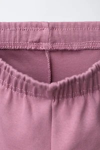 WIDE LEG RAISED TEXT PLUSH PANTS