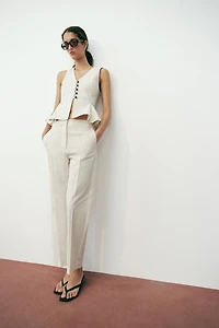 STRIPED PEPLUM VEST