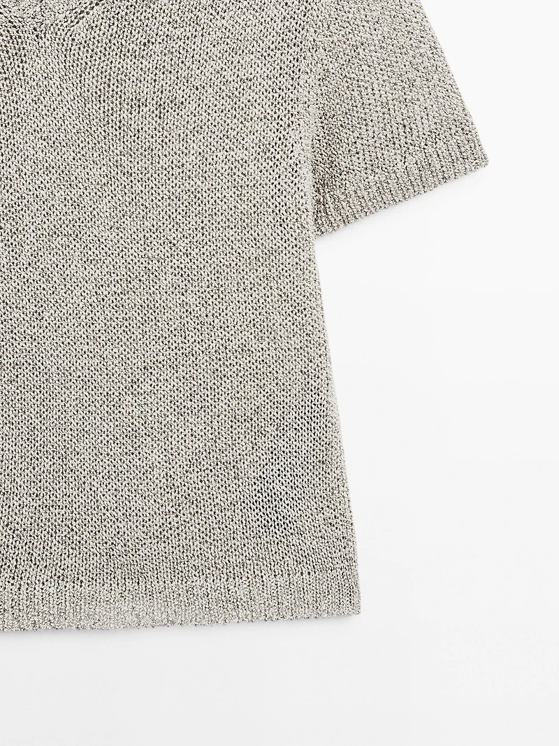 Knit sweater with fabric detail