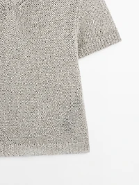 Knit sweater with fabric detail