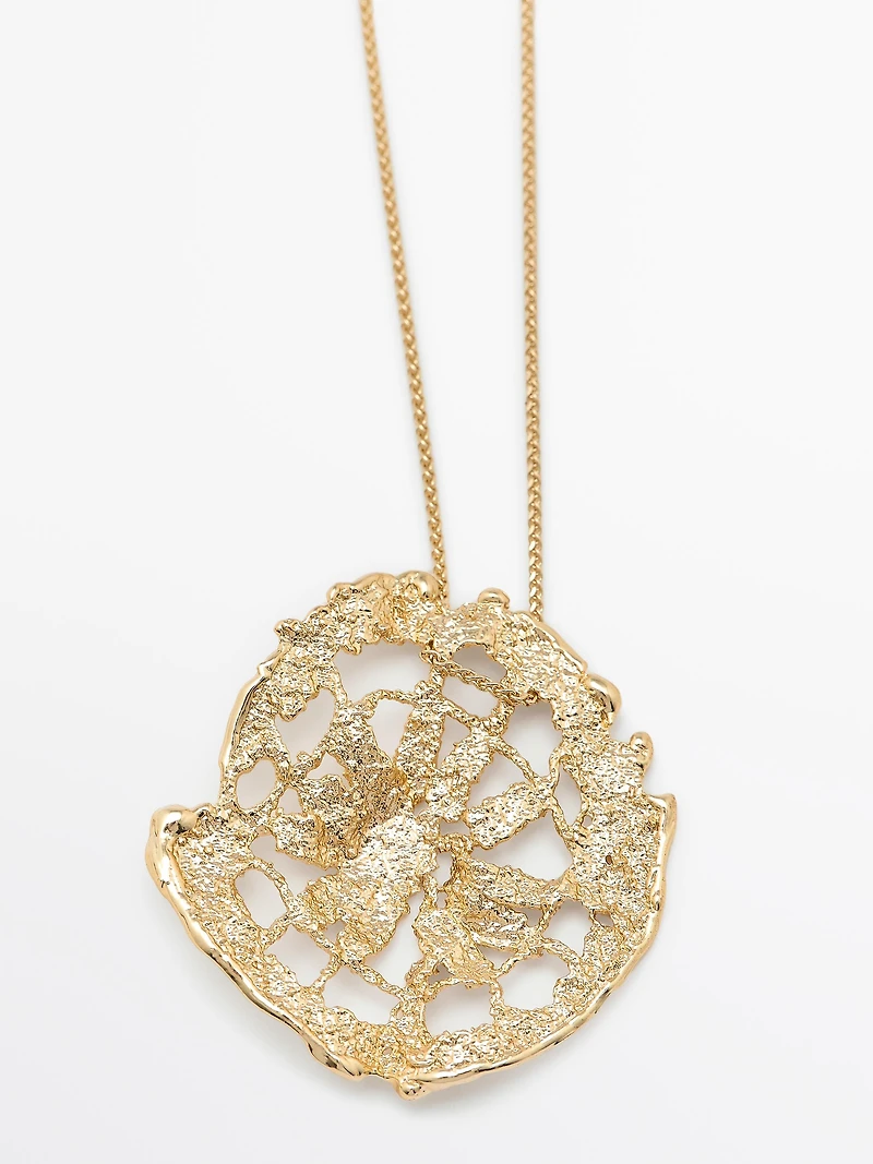 Necklace with lace piece pendant
