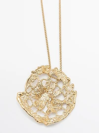 Necklace with lace piece pendant