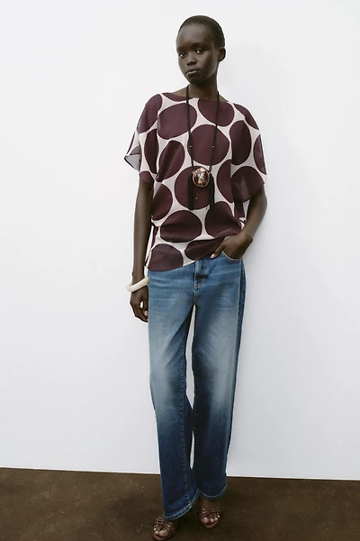 TOP SEMI-TRANSPARENT À POIS