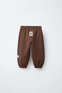 PANTALON DE JOGGING À INSCRIPTION FLOCKÉE