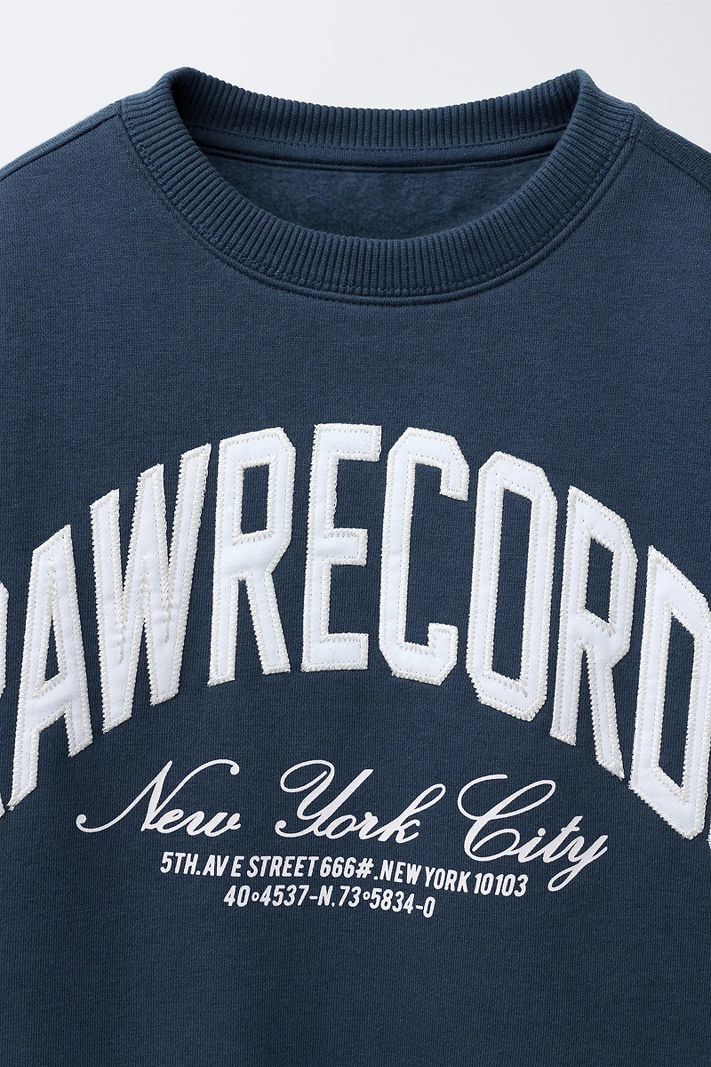 PLUSH TEXT SWEATSHIRT