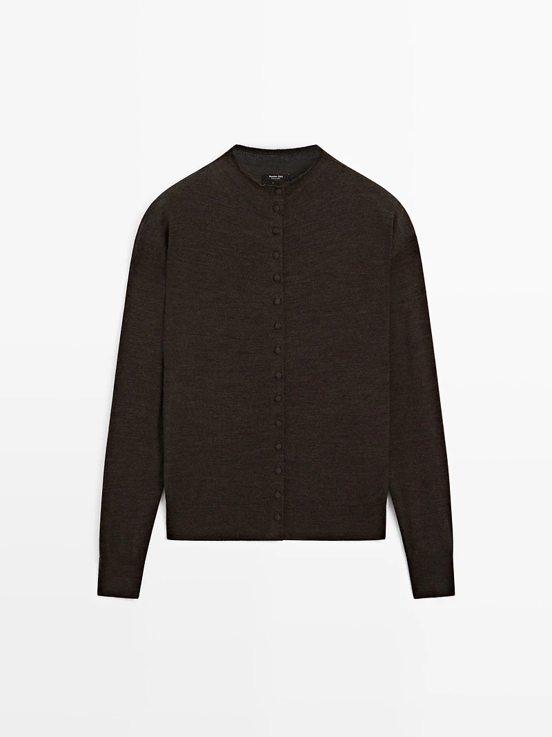 Mock turtleneck cardigan with covered buttons