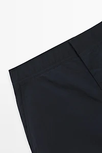 Plain swimming trunks with waist detail