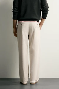 PLEATED STRAIGHT FIT CHINO PANTS