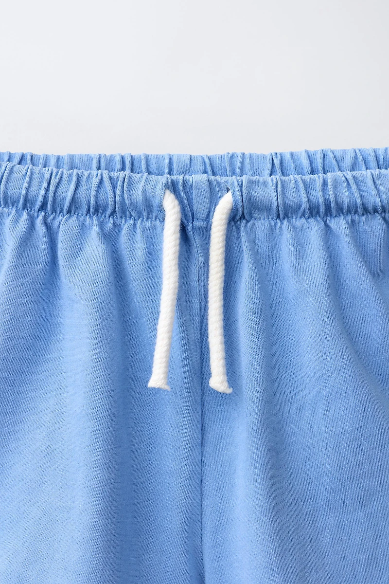ENSEMBLE JOGGING T-SHIRT ET BERMUDA UNI