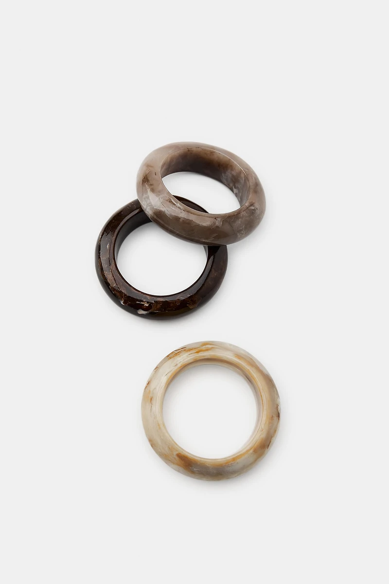 THREE-PACK OF RIGID RESIN BRACELETS