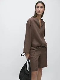 100% linen blouse with topstitching detail