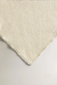 PLAID DOUX À FRANGES