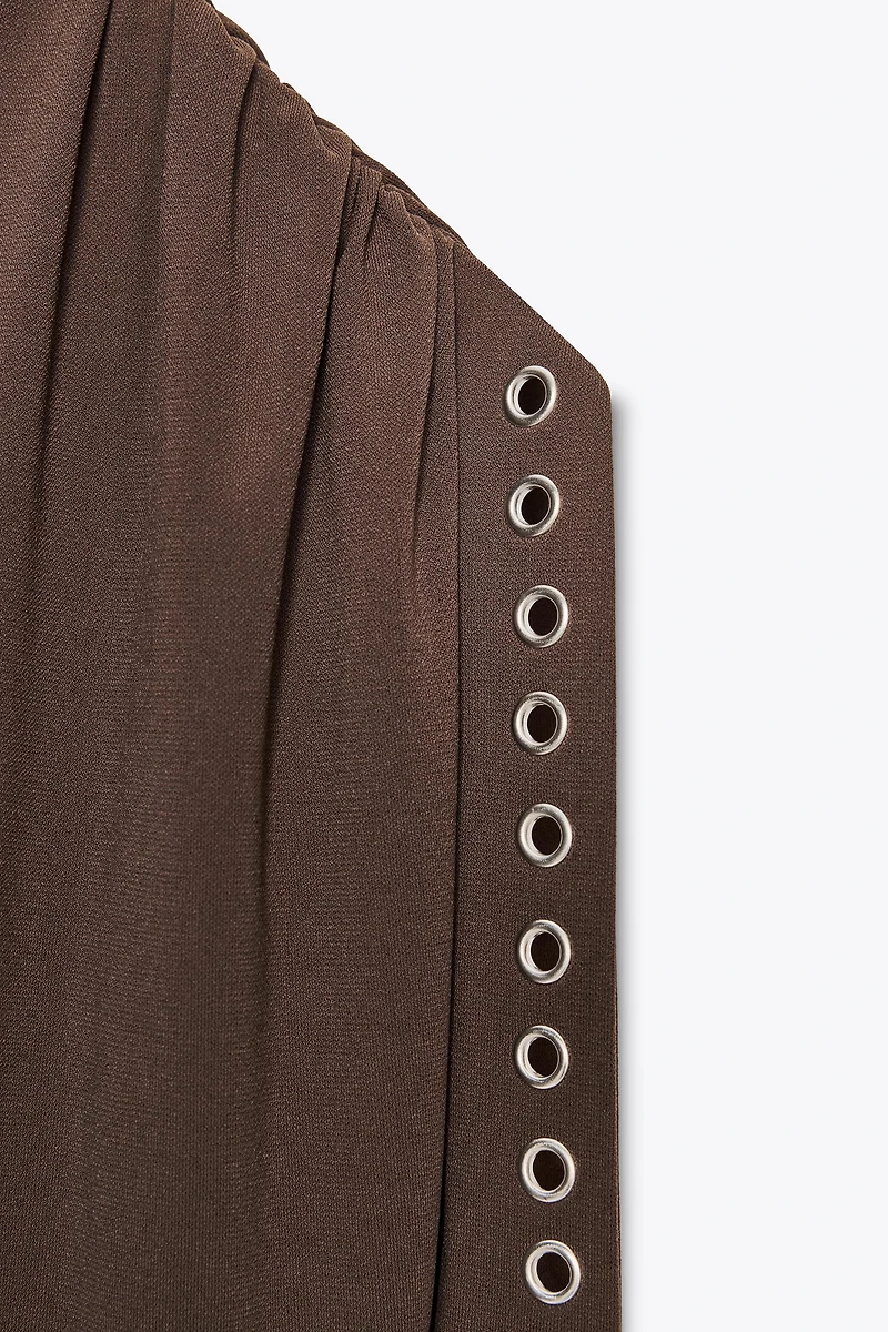 ASYMMETRIC CROTCHET DRESS WITH GROMMETS