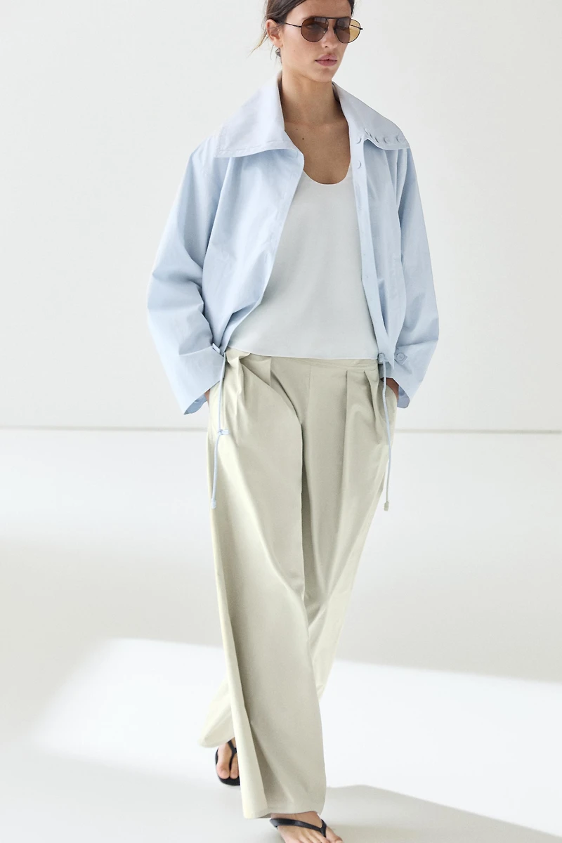 Wide-leg pants with pleated sash detail