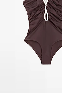 Swimsuit with contrast gathered detail