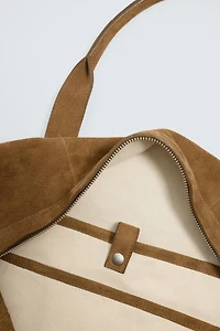 LIMITED EDITION LEATHER TRAVEL BAG