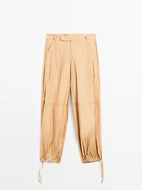 Lightweight trousers with strap details - Studio