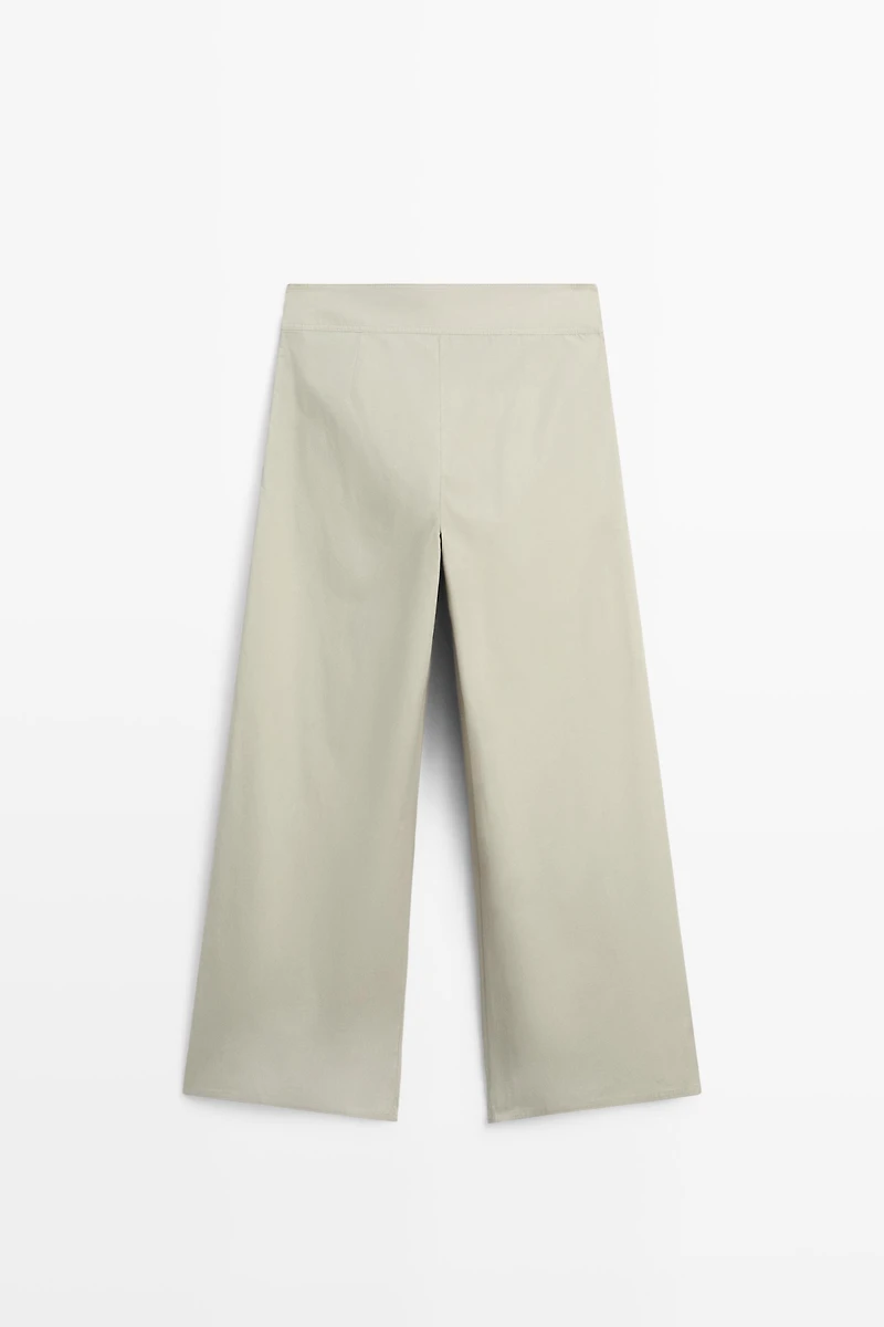 Wide-leg pants with pleated sash detail