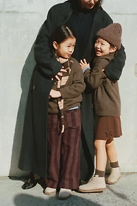 WOOL BLEND KNIT SKIRT WITH BOWS