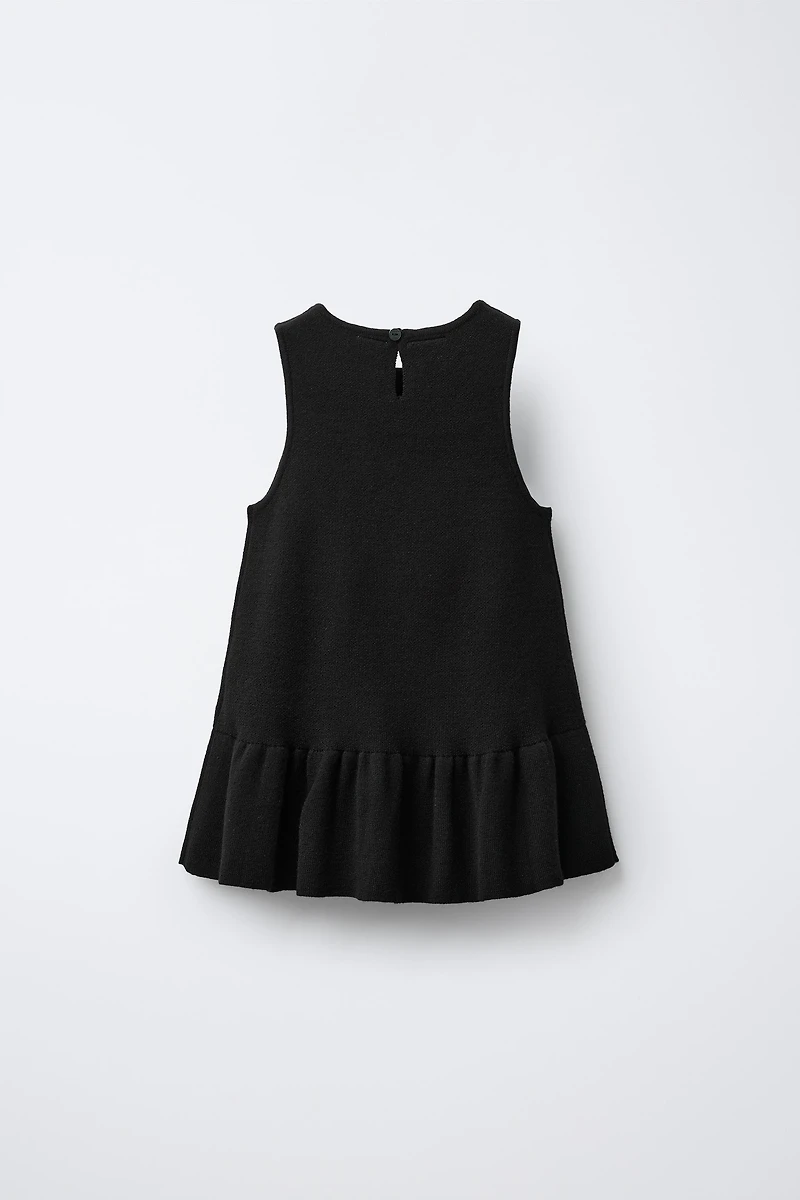 ROBE EN MAILLE AVEC NŒUD ET PAILLETTES