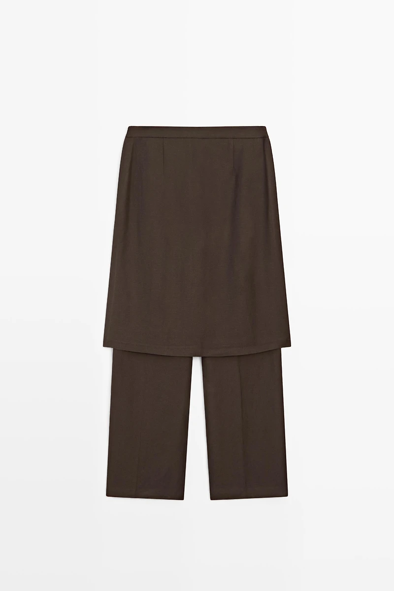 Flowing trousers with skirt detail