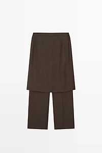 Flowing trousers with skirt detail