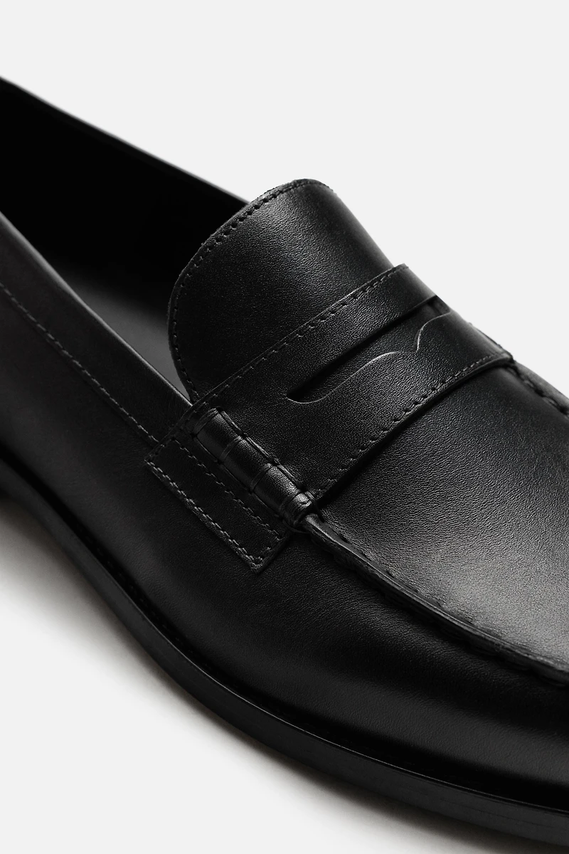 MOCASSINS EN CUIR AVEC MASQUE