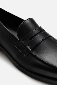 MOCASSINS EN CUIR AVEC MASQUE