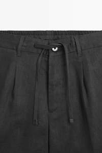 Linen Bermuda shorts with elastic waist