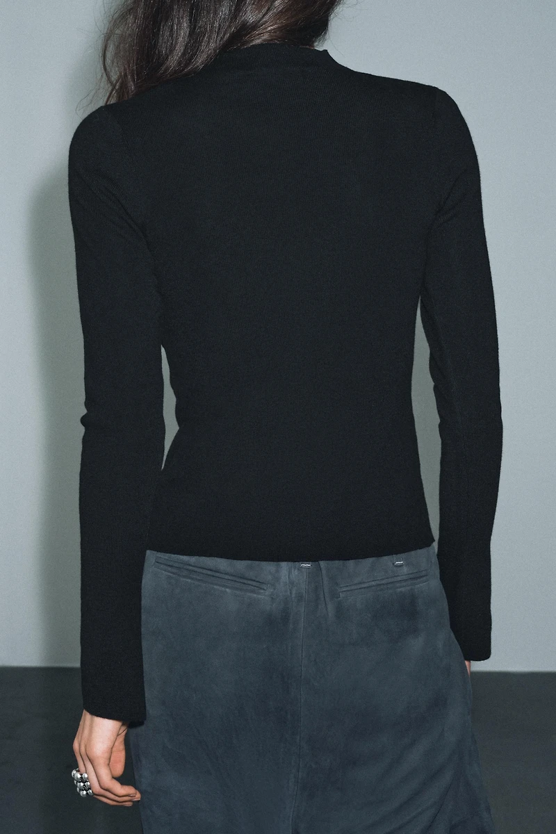 GILET DRAPÉ EN MAILLE