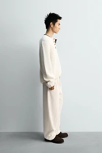 TEXTURED WEAVE HENLEY NECK SWEATER