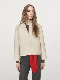 Short quilted jacket with shirt collar