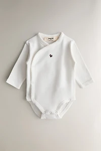 EMBROIDERED COTTON BODYSUIT SET (PACK OF 7)