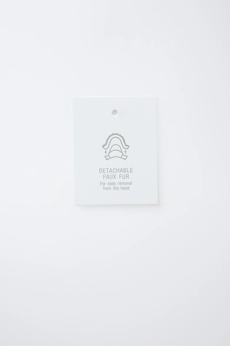 DOUDOUNE EN PLUME ET DUVET DÉPERLANTE CAPUCHE EFFET FOURRURE AMOVIBLE