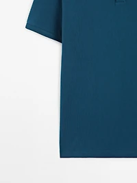 Micro textured piqué cotton polo shirt