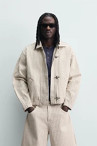 BLOUSON COURT RAYÉ À BRANDEBOURGS