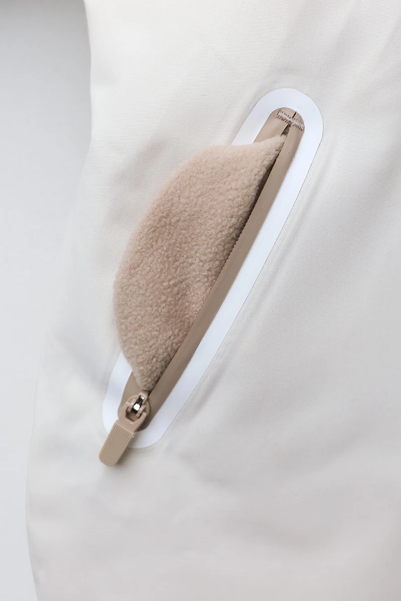 WATER RESISTANT AND WINDPROOF RECCO® SYSTEM SKI COLLECTION LONG JUMPSUIT WITH FAUX FUR HOODIE