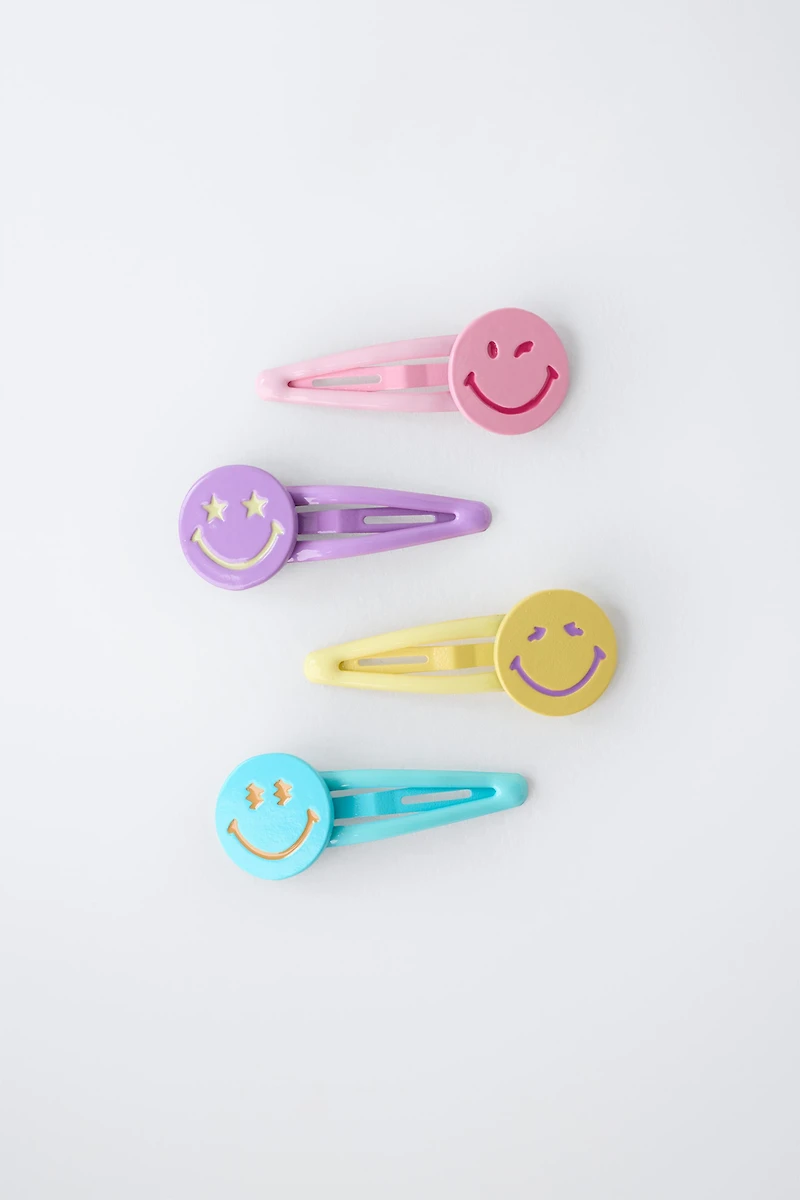 PACK OF FOUR SMILEYWORLD ® HAIR CLIPS
