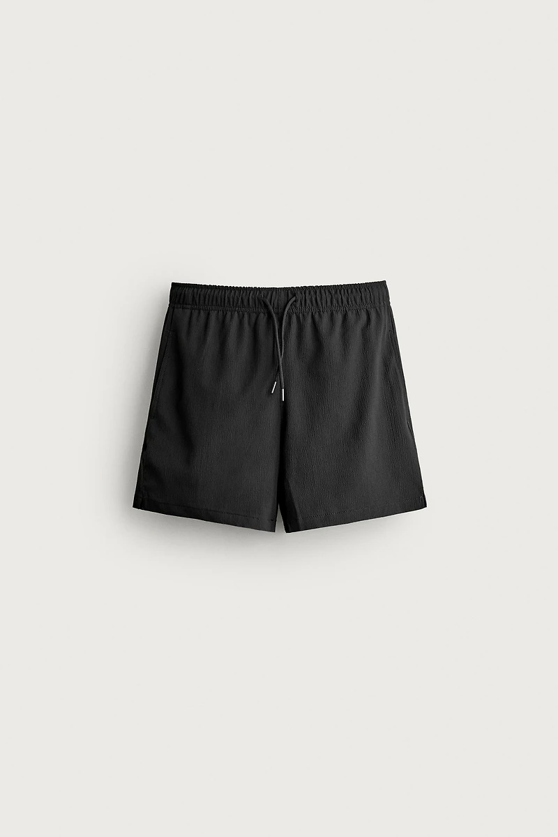 MAILLOT DE BAIN MI-LONG TEXTURE IRRÉGULIÈRE