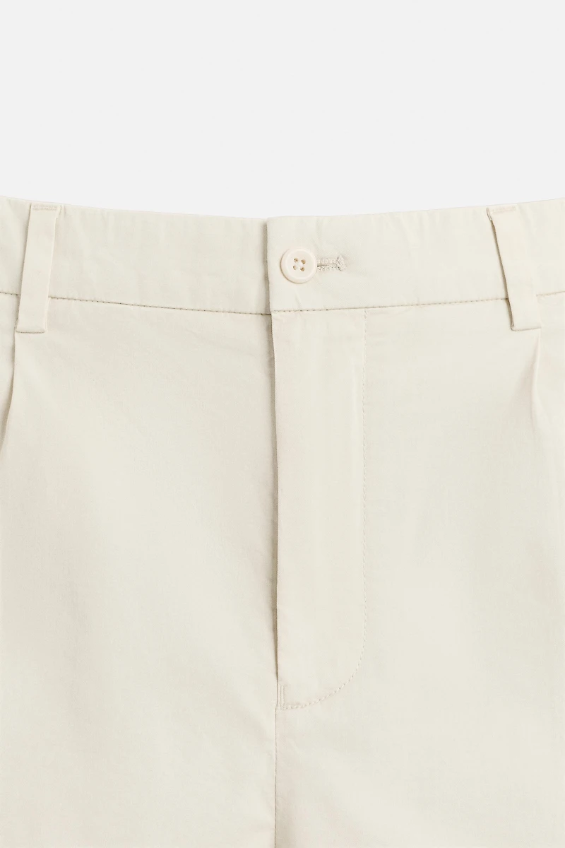 REGULAR FIT PLEATED BERMUDA SHORTS