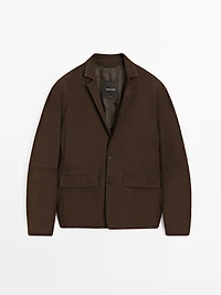 Blazer en cuir finition daim avec coutures apparentes