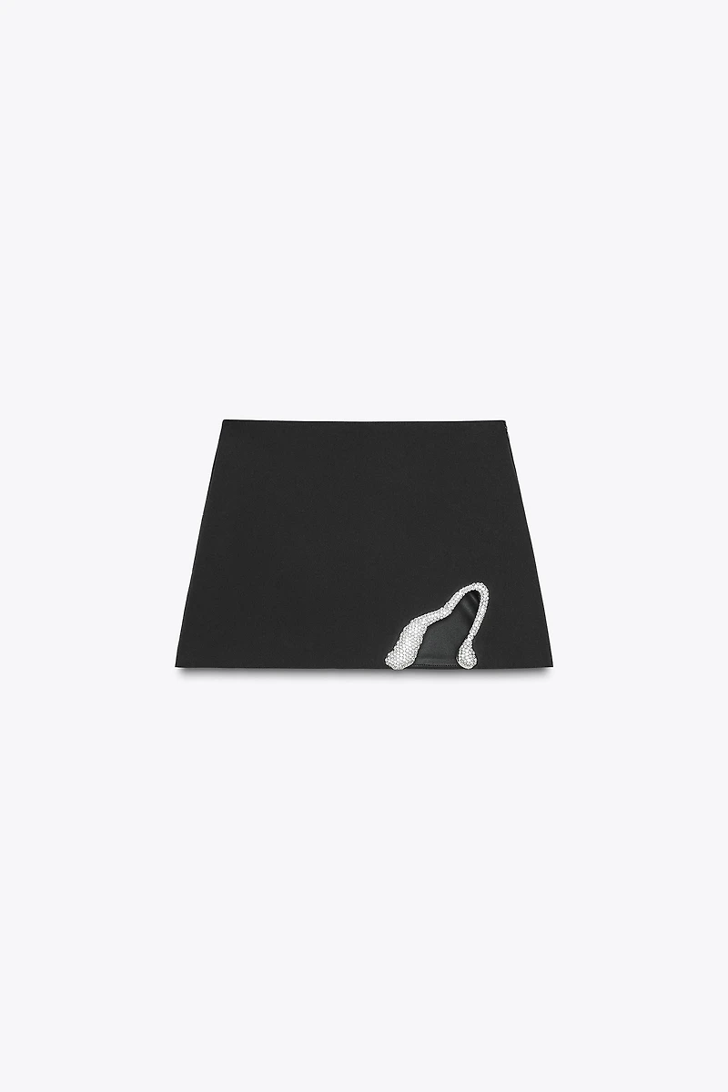 MINI-JUPE PIÈCE BIJOUX