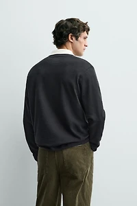 POLO À BANDES CONTRASTÉES