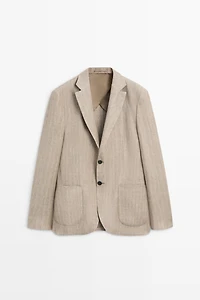 Blazer rayé à chevrons en lin