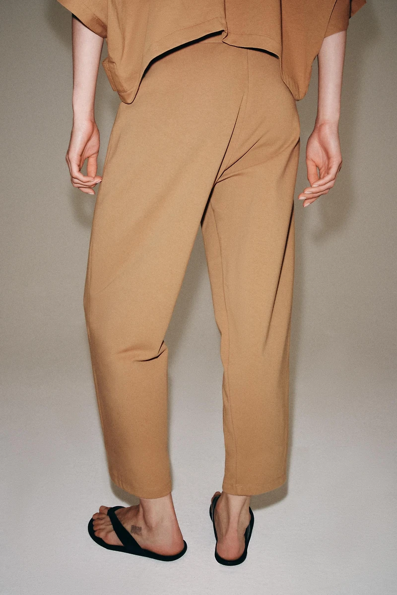 INTERLOCK TAPERED PANTS