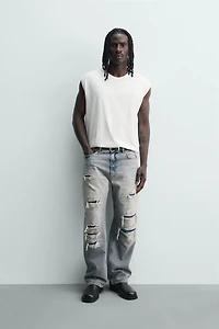 LOOSE FIT RIPPED JEANS