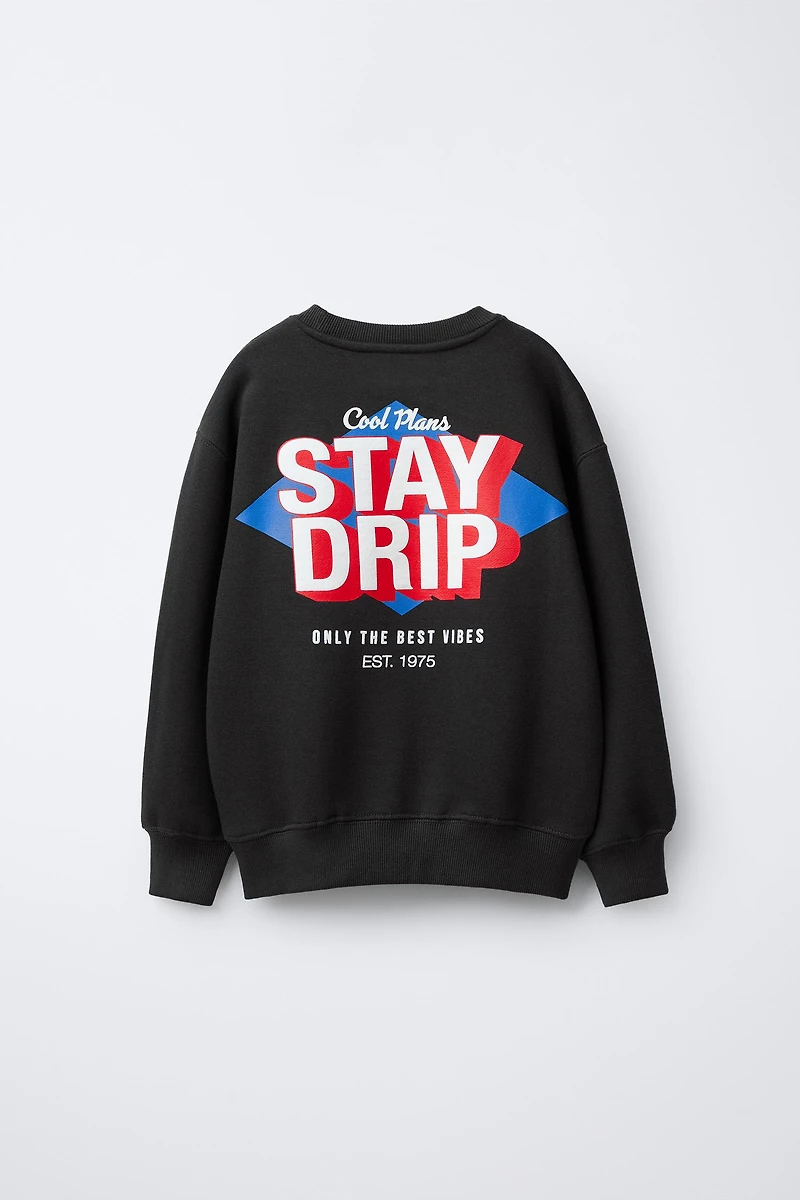 RAISED TEXT SWEATSHIRT