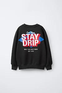 RAISED TEXT SWEATSHIRT