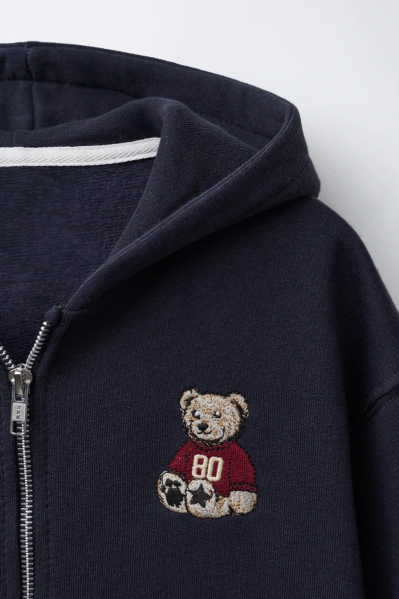 EMBROIDERED BEAR ZIP SWEATSHIRT